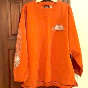 COPY - Men’s orange HD Screamin’ Eagle sweatshirt.